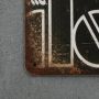 metalowa tabliczka na ścianę